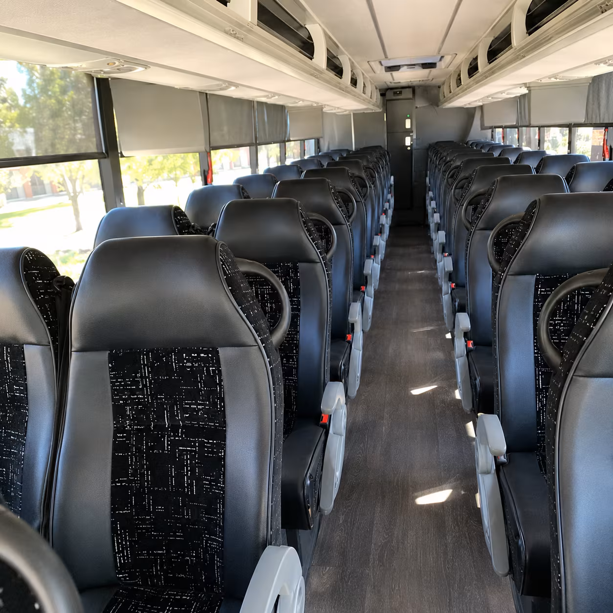 how distance and duration affect charter bus rates in rochester hills